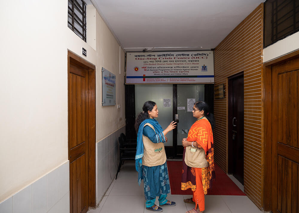 Nazneen in discussion with her colleagues 