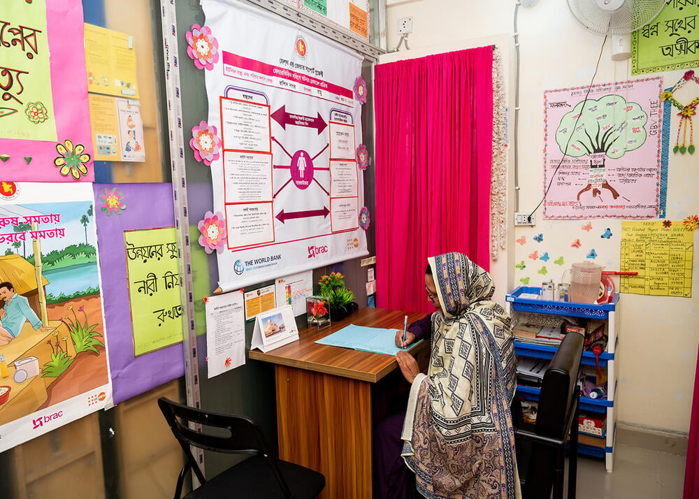 Meherun works in her office