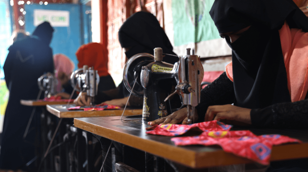 Girls are trained in the Rohingya camps to sew reusable pads 